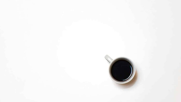 top view photography of mug with black liquid