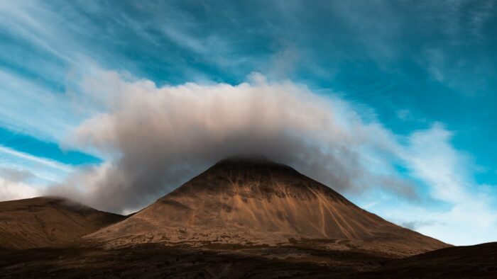 pyramid mountain covered with clouds