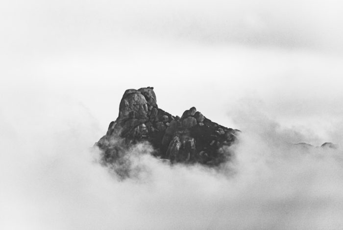 greyscale photo of mountain
