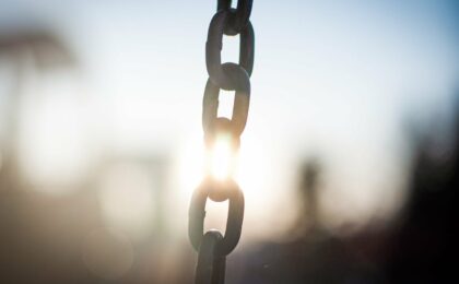 grey metal chain in close up photography