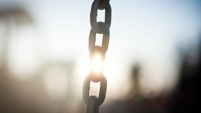 grey metal chain in close up photography